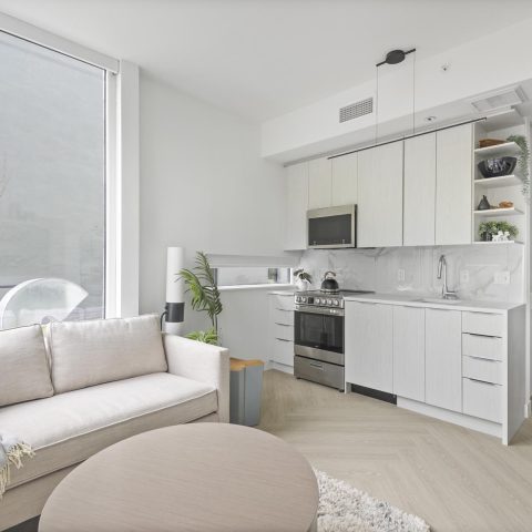 European styled kitchen with full-height backsplash